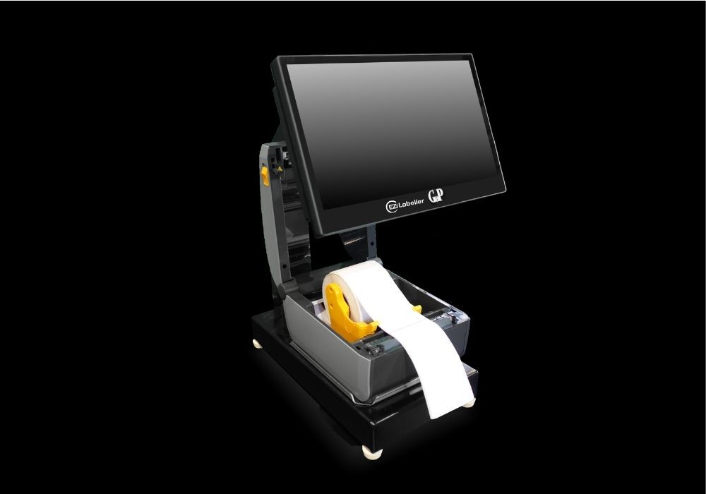 Ezi Labeller with the media bay open showing an Ezi Linerless Label roll loaded